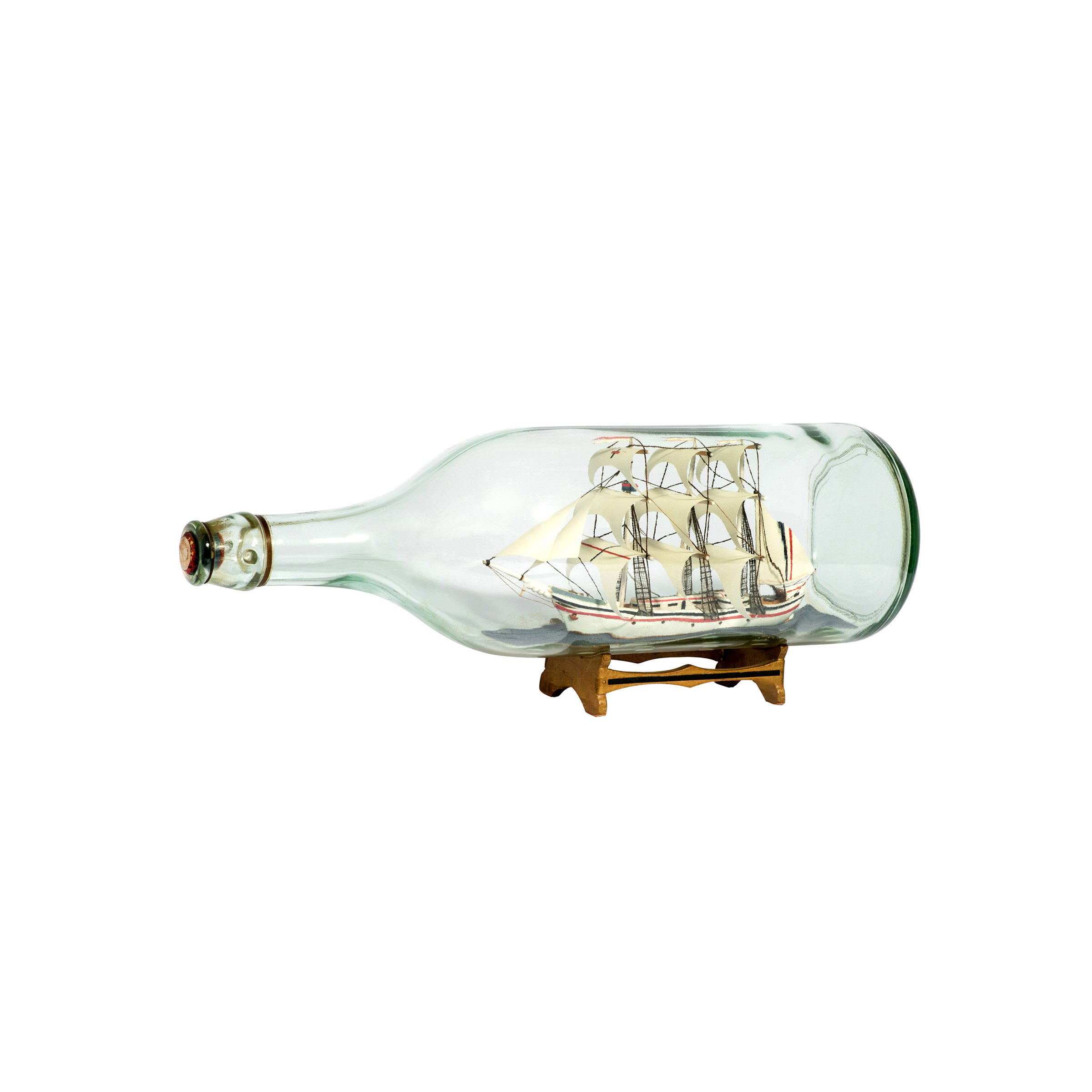A miniature sailing ship in a bottle